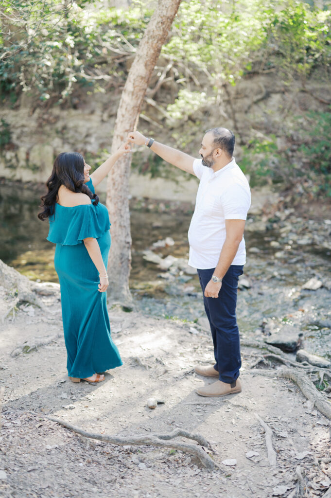 expecting parents dance creekside in park in dallas 