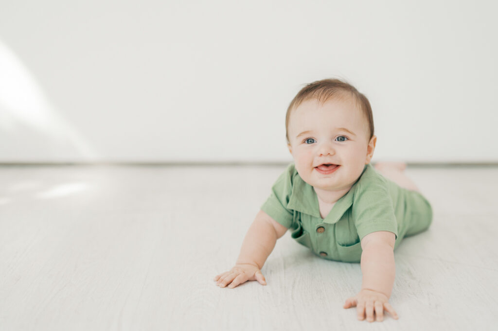 indoor milestone photo in fort worth - little boy smiling