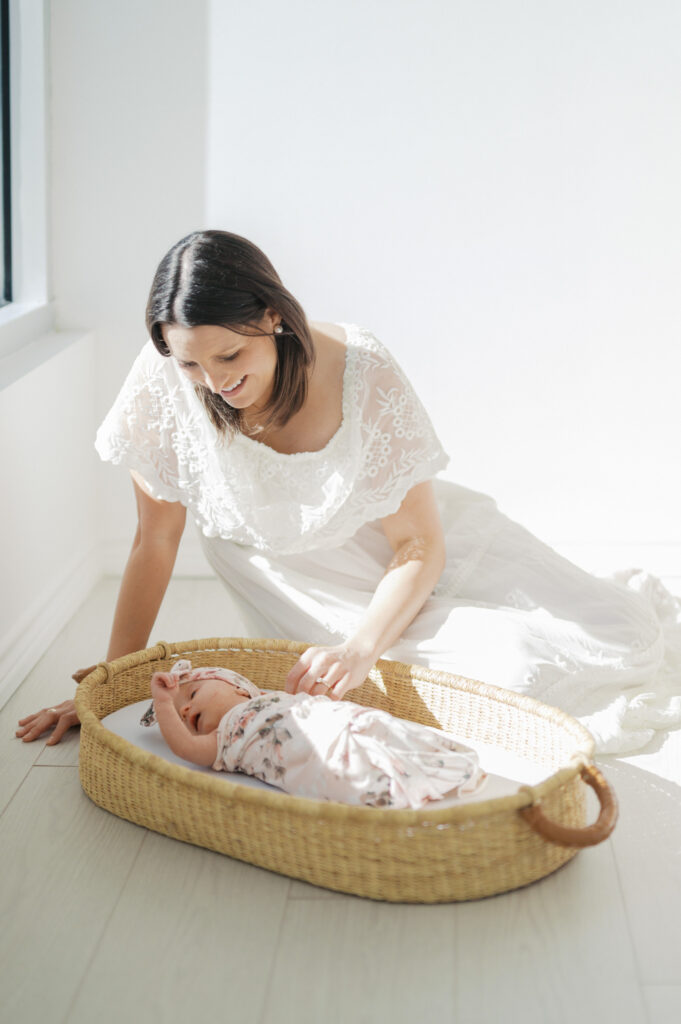 lifestyle newborn photos in Willow Park studio