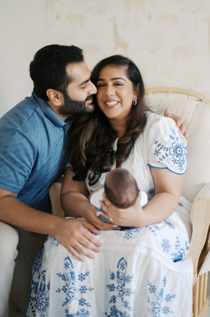 fort worth newborn photographer, portrait of parents smiling holding baby