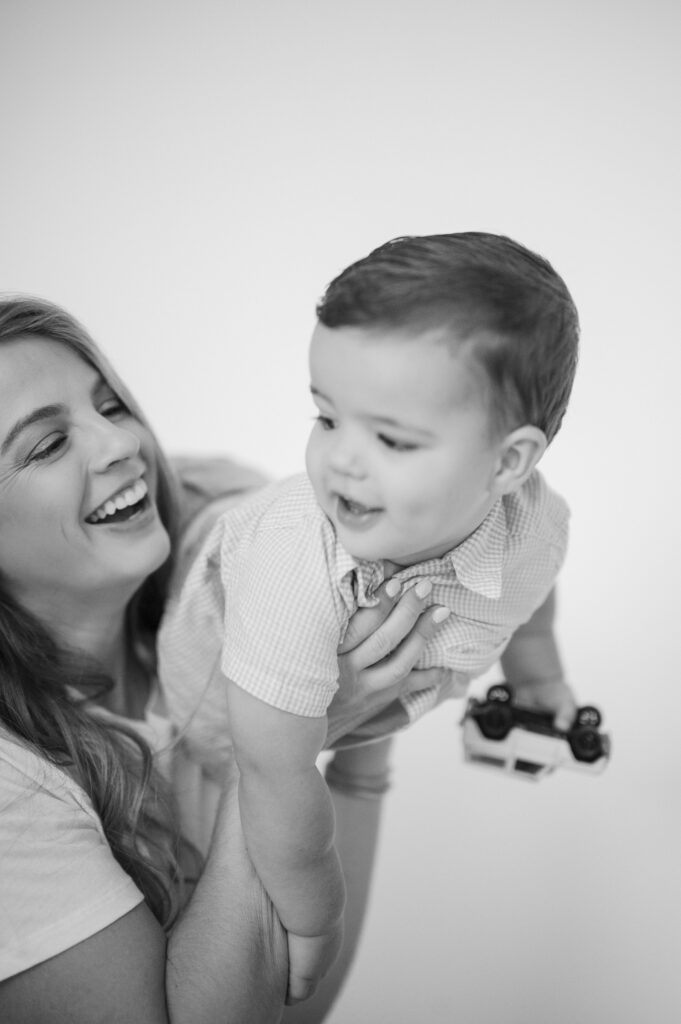 mom flies son like an airplane in the studio in fort worth