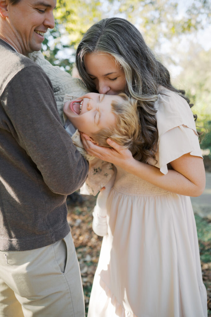 candid family portrait at the fort worth botanic garden