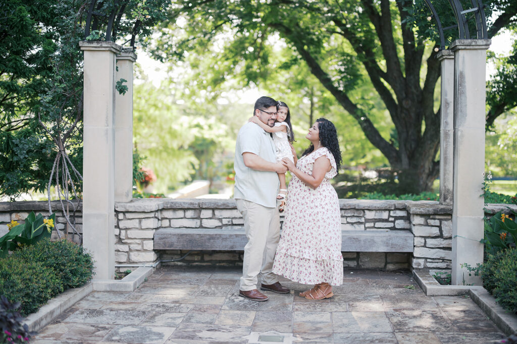 family outside at the fort worth botanic garden during the summer