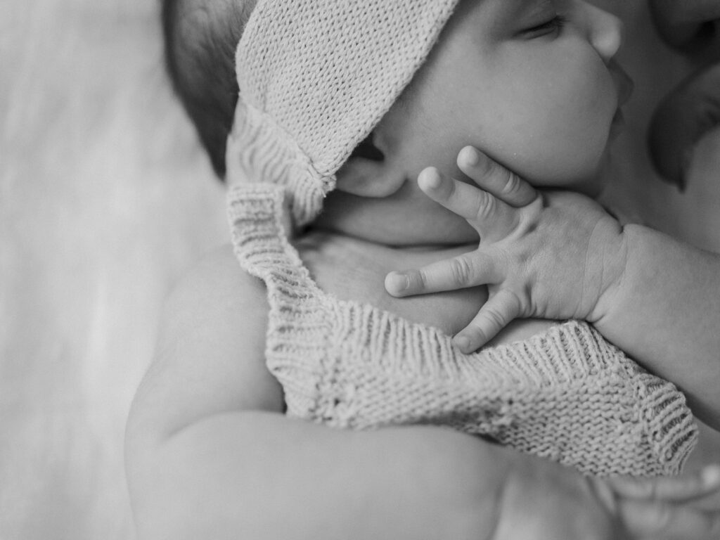 newborn details in black and white during newborn photos at the beverly harris house