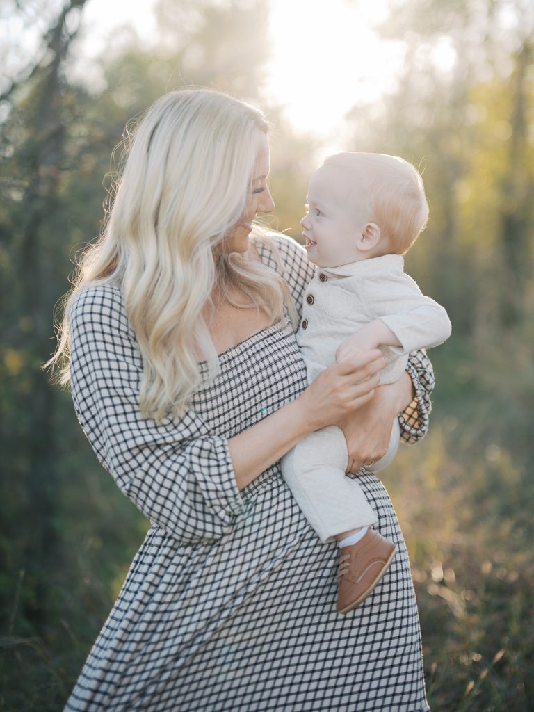 portraits during fall family photography session of mom and toddler boy