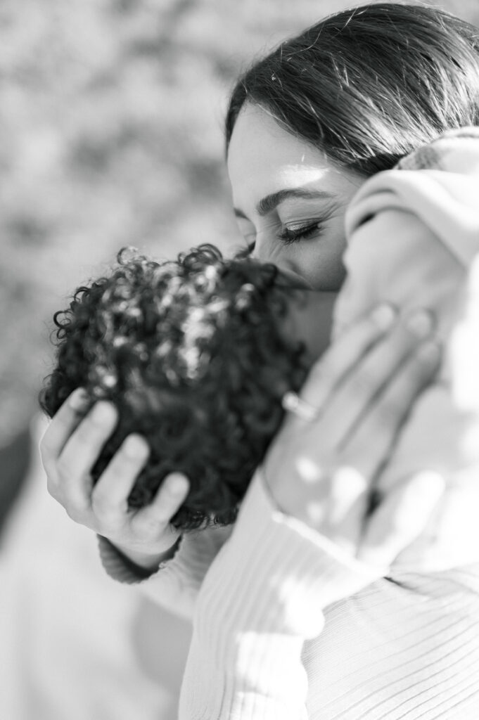 mom embraces young son 