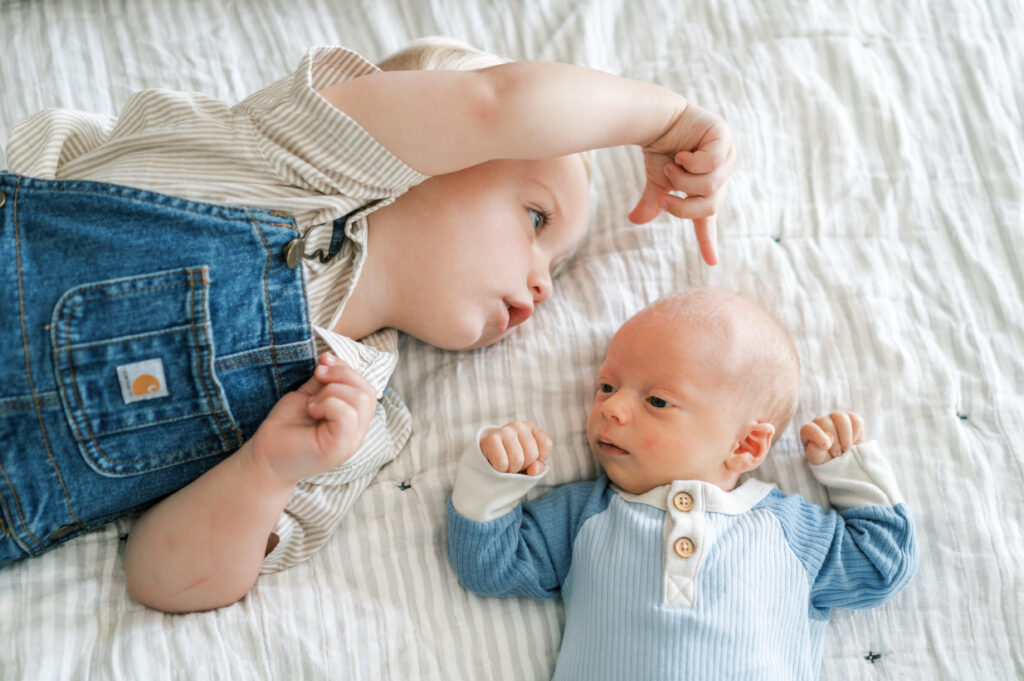 in-home newborn session in fort worth, photo of toddler and baby