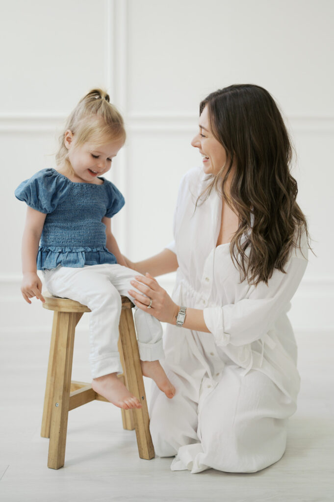 studio portraits of mom and young girl