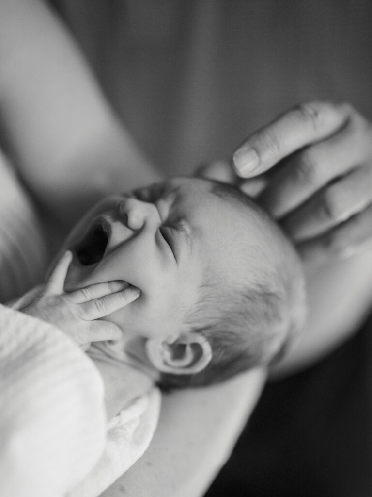 black and white detail shot of newborn baby yawning during in home lifestyle newborn photos, fort worth newborn photographer